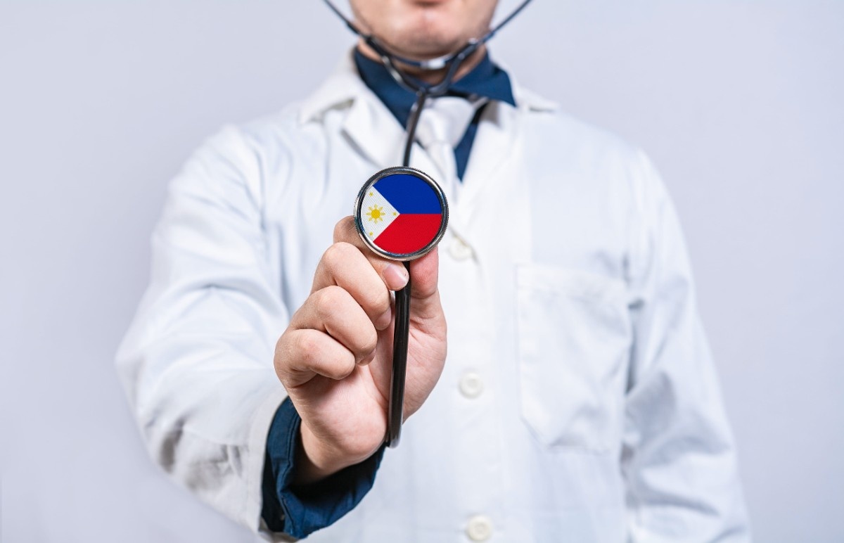 Philippines healthcare concept with a doctor holding a stethoscope