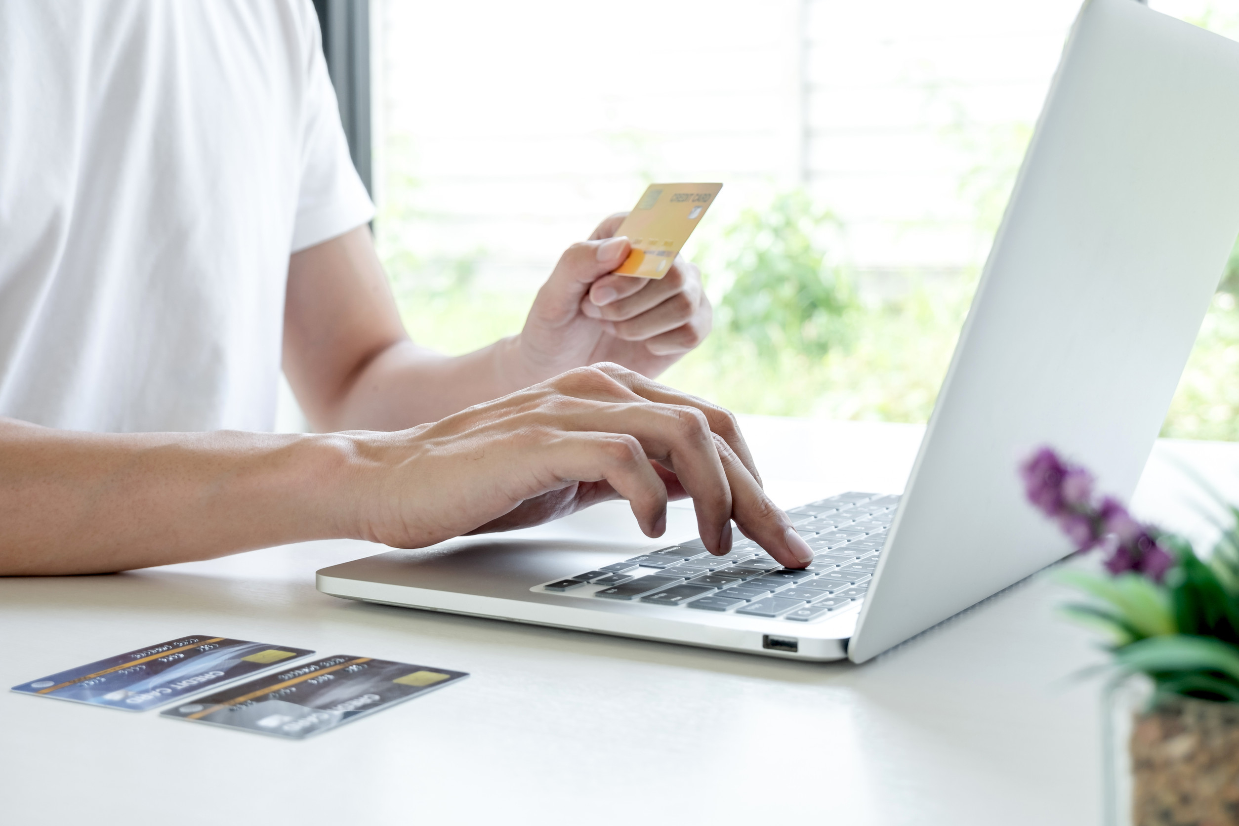 Person paying online with credit card