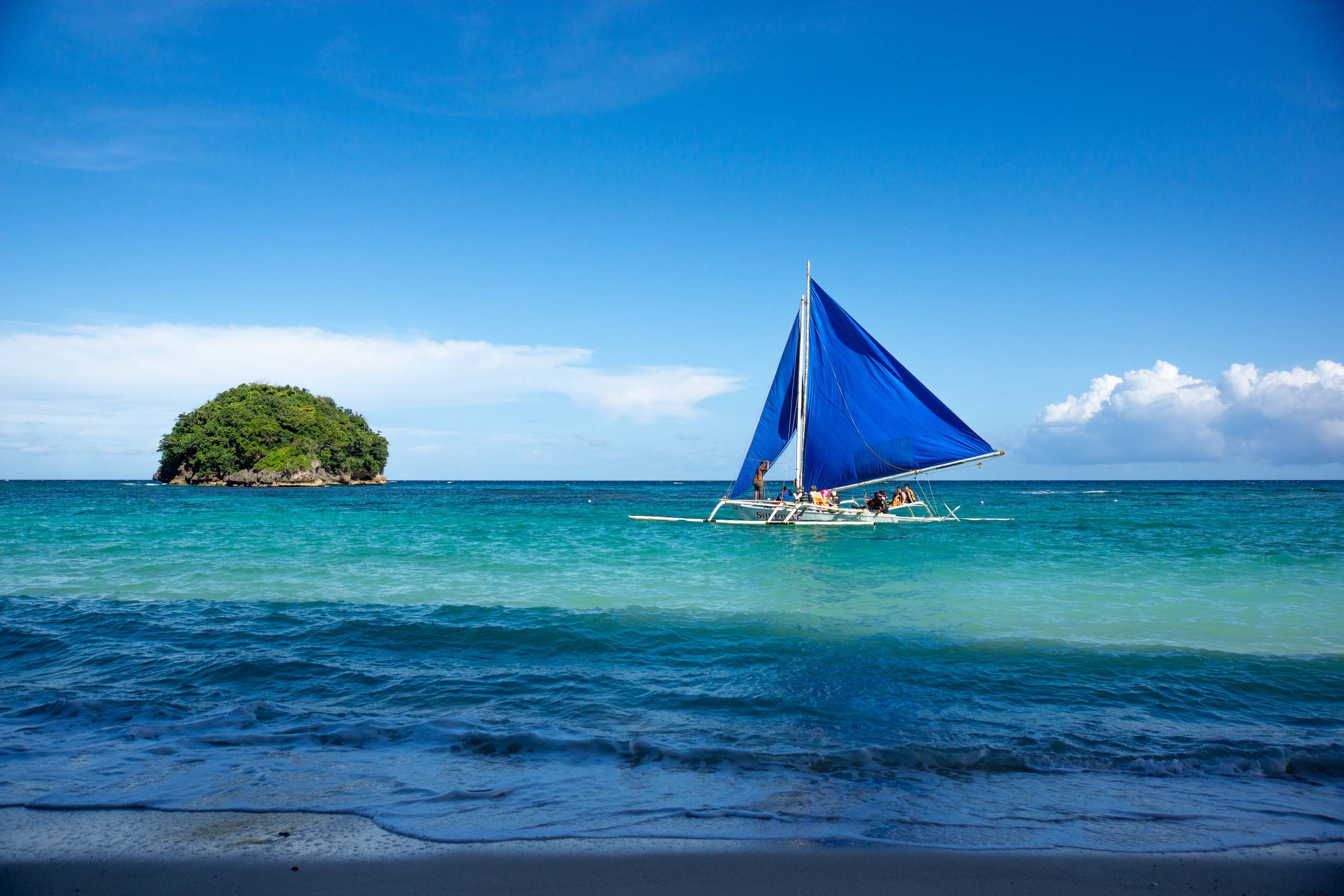 The local touristic boat and coastline