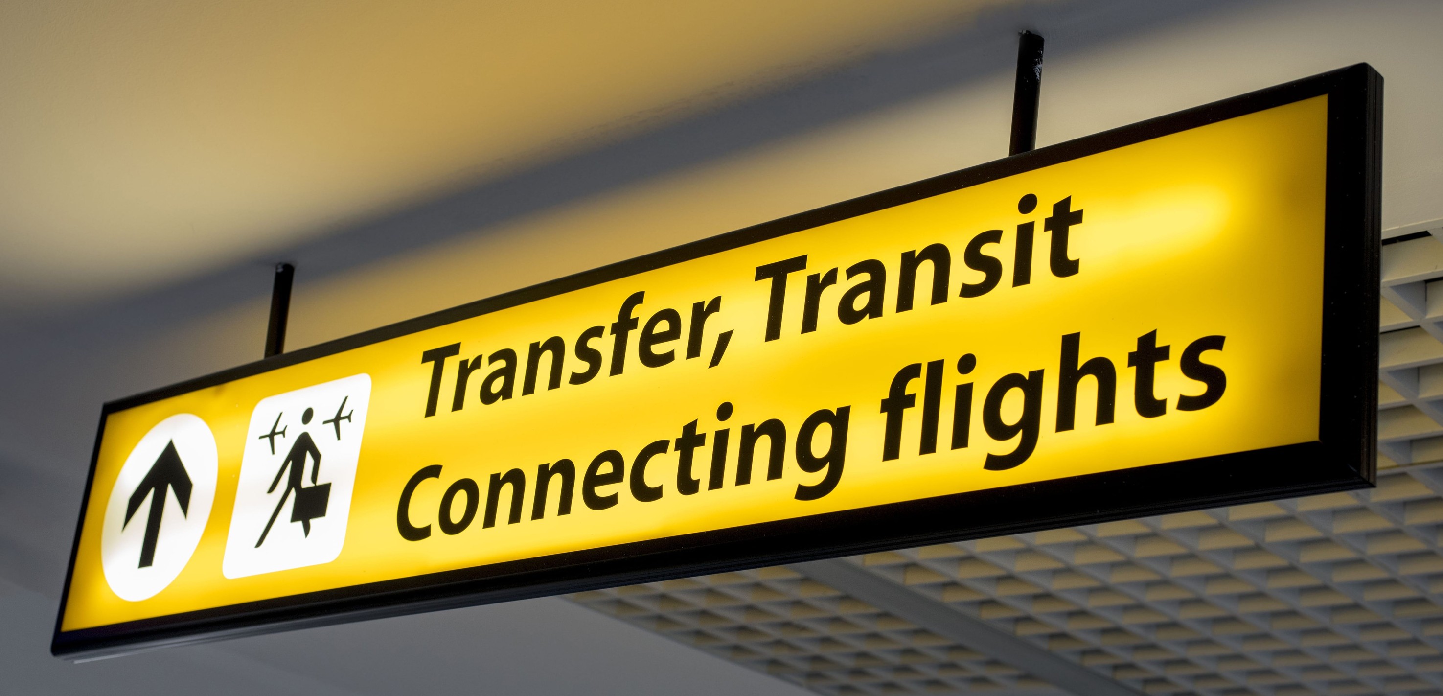 Transfer Transit And Connecting Flight Sign Board At The Airport